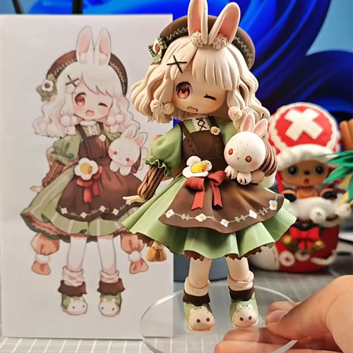 Custom portrait clay figurine – side profile showing intricate hair and outfit details