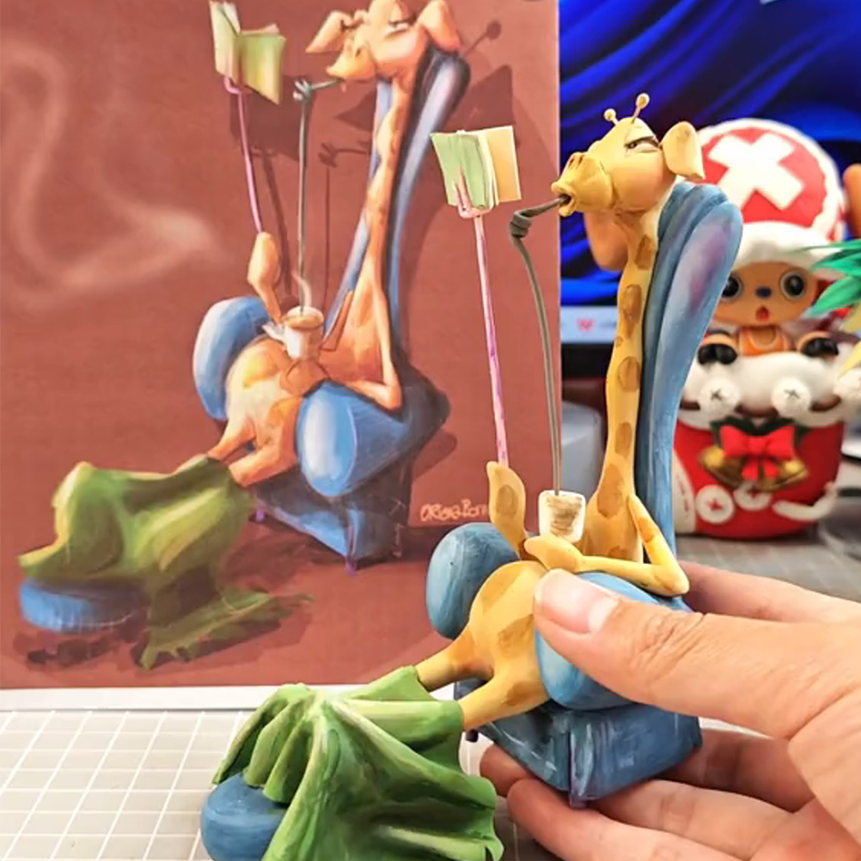 Bespoke clay portrait figurine with clear display base – gift packaging view