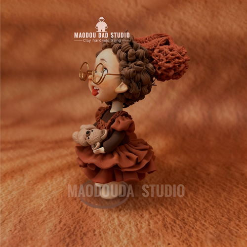 Red Dress Princess hand-sculpted clay figurine – side view showing curls and dress details